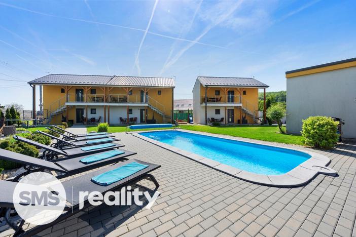 Prodej apartmánu, Milovice, 255 m2