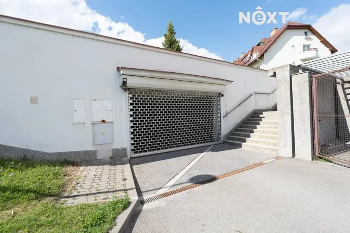 Prodej podílu garážového stání, Brno, Högrova, 11 m2